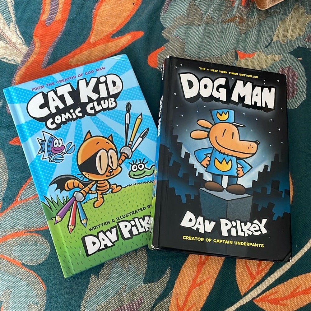 Two children’s hardcover Books - Dog Man & Cat Kid by Dav Pilkey